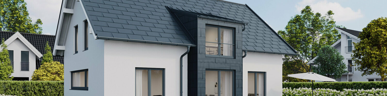 Single-family house with pitched roof with PREFA R.16 roof panels and FX.12 façade panels in P.10 anthracite 
